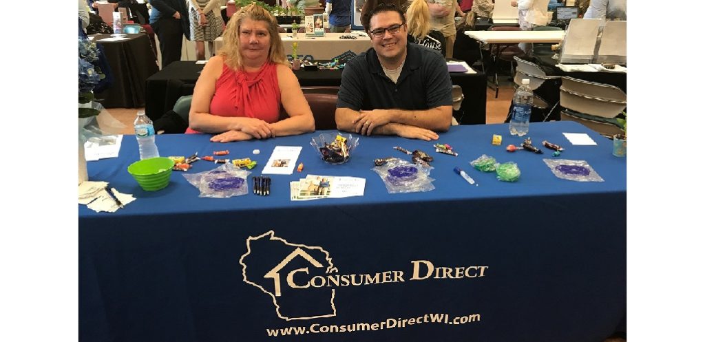 Lori Schoblaski (Program Coordinator) and Matt Moore (Regional Coordinator) hosting the Consumer Direct Wisconsin resource booth.