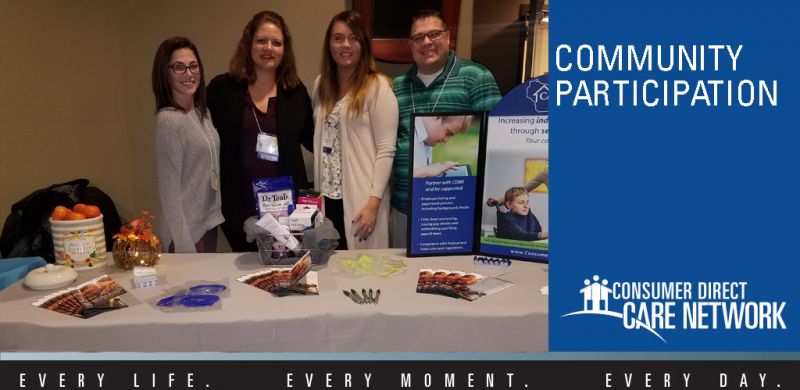 Nicole Ryan, Trista, Jordan, and Matt smiling at the Care Network Wisconsin booth.